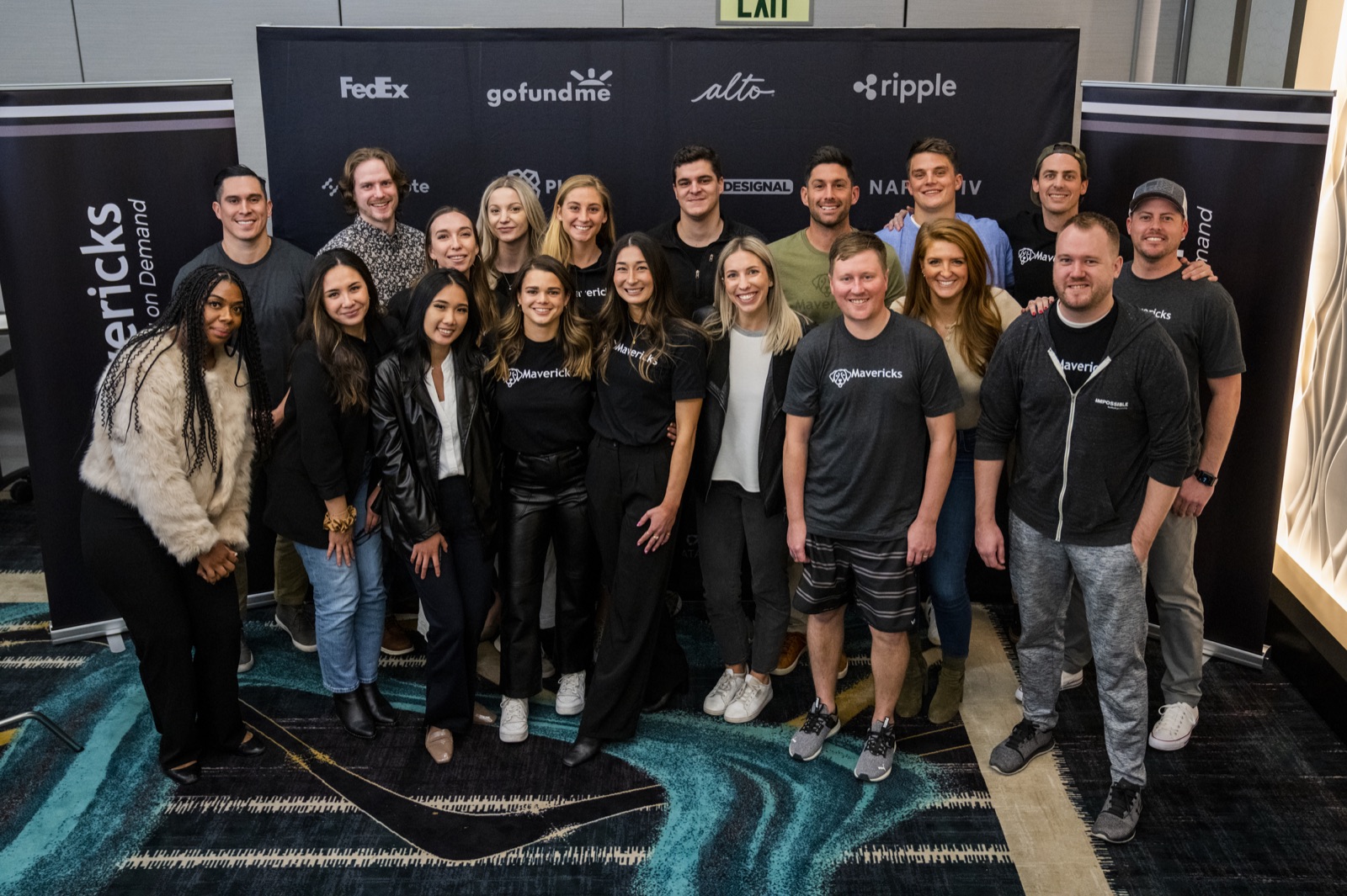 The Mavericks team together at a company event